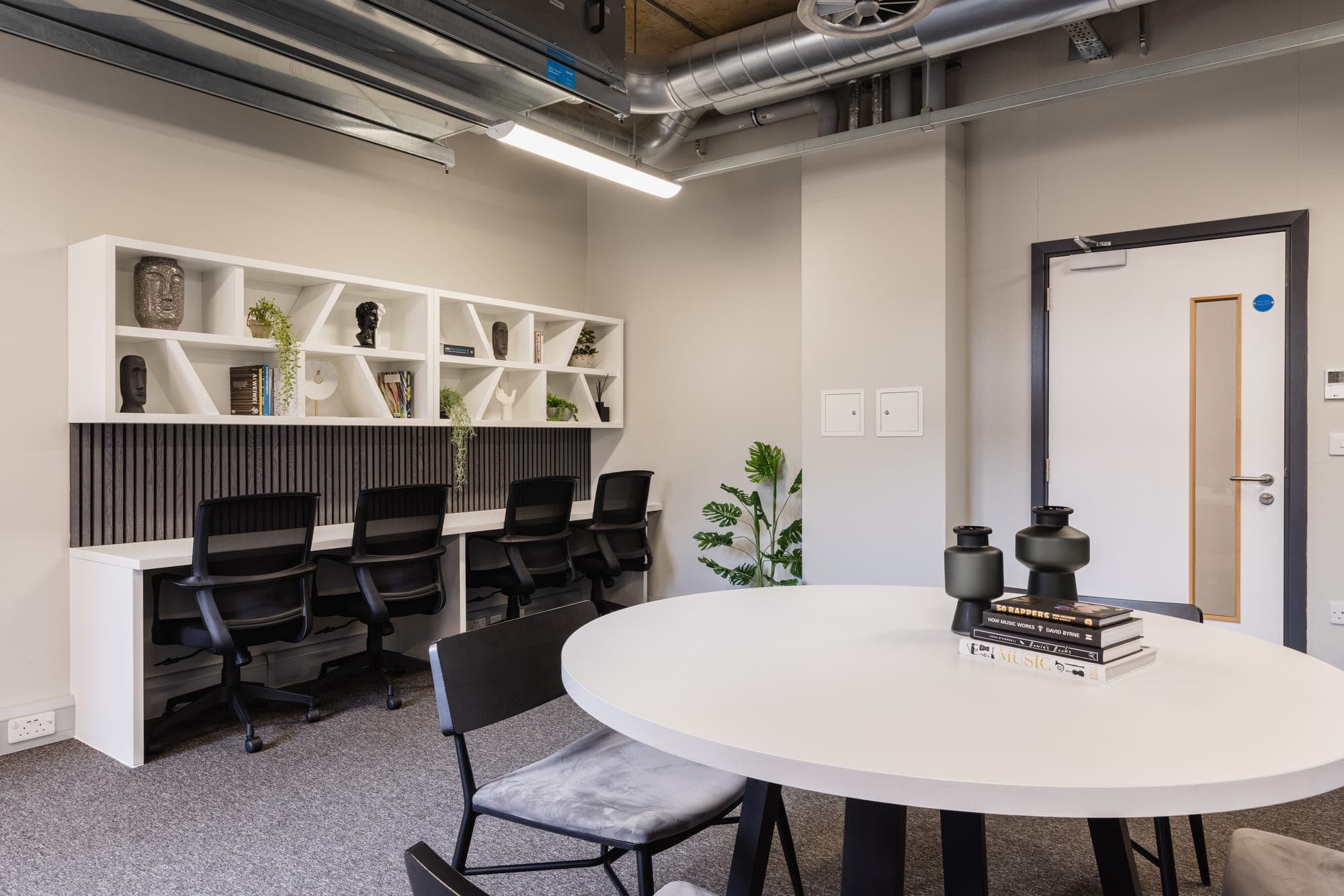 Study desks and shelving in the study space at Globe Works